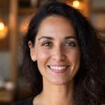 Headshot of Samira Khan, a woman in her early 40s with a warm and approachable smile