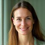 Headshot of Sarah O'Connell, a calm and approachable wellness coach with a focus on mental well-being.